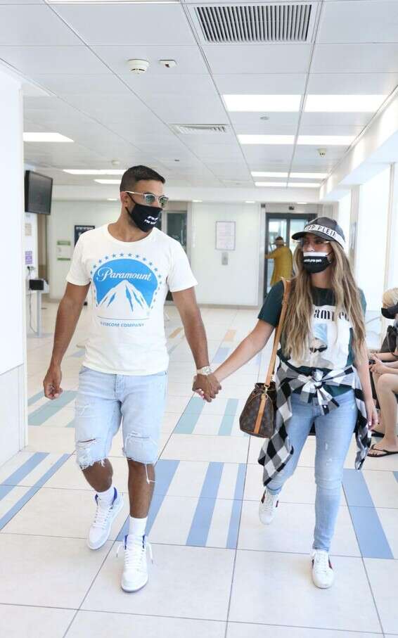 עכשיו צריך להיזהר מהקורונה. שר פיטנס ובעלה // צילום: אור גפן